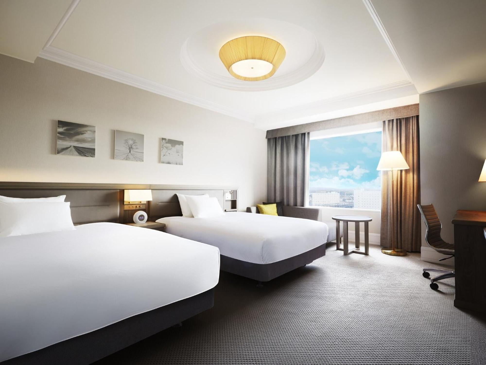 Ana Crowne Plaza Chitose By Ihg Hotel Exterior foto A room at the hotel